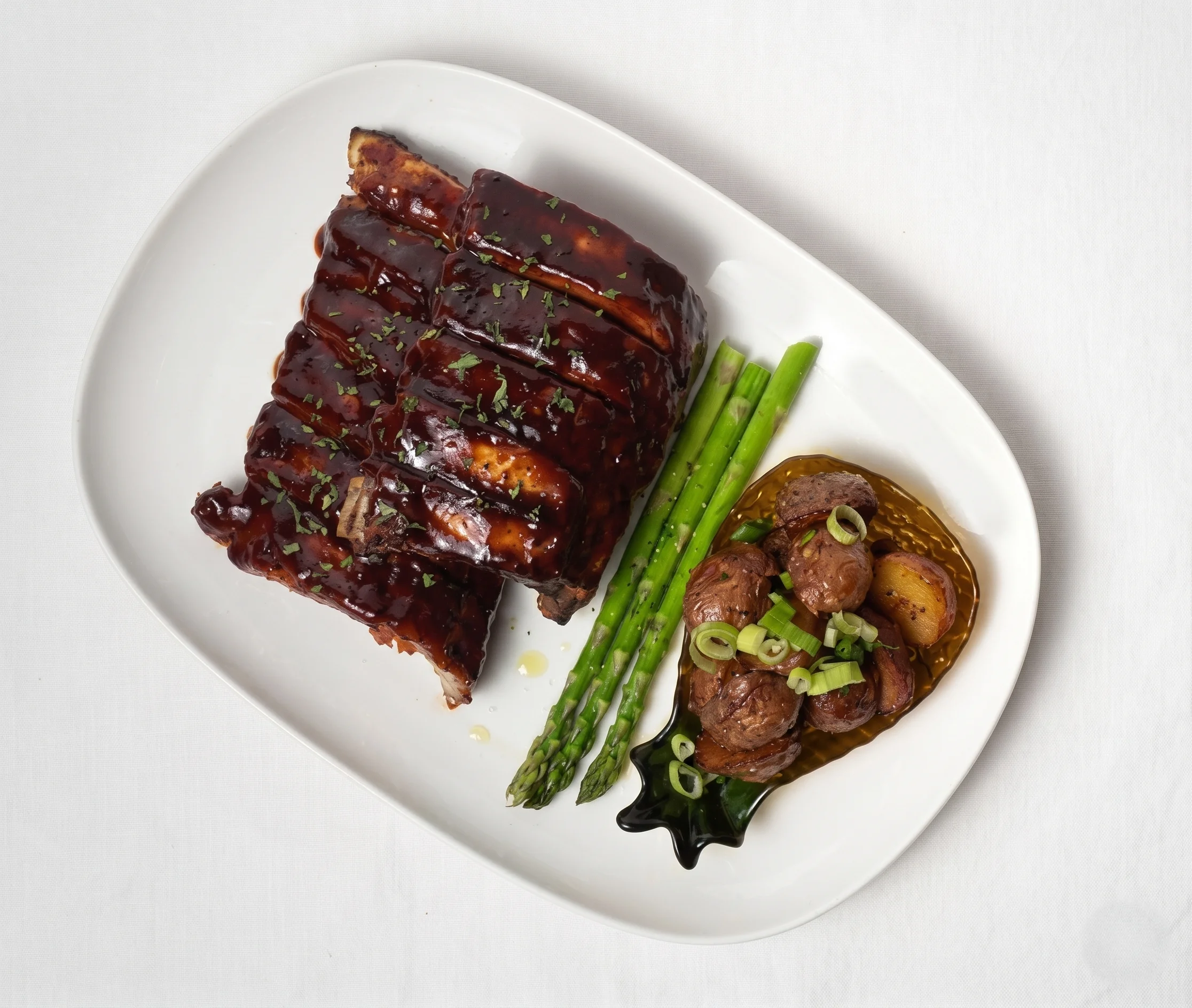 Slow-cooked baby back ribs with BBQ, Greek and Honey Garlic sauces at Mr. Ribs Saskatoon