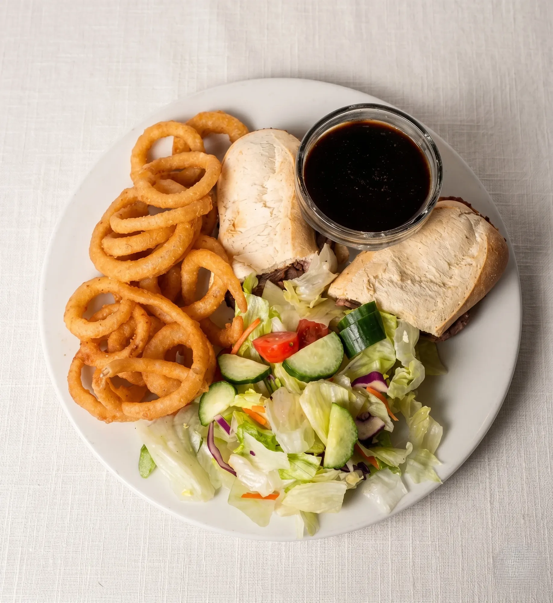 Beef Dip at Mr. Ribs Family Restaurant & Lounge in Saskatoon — Slow-Roasted Beef on a Hoagie with Rich Au Jus