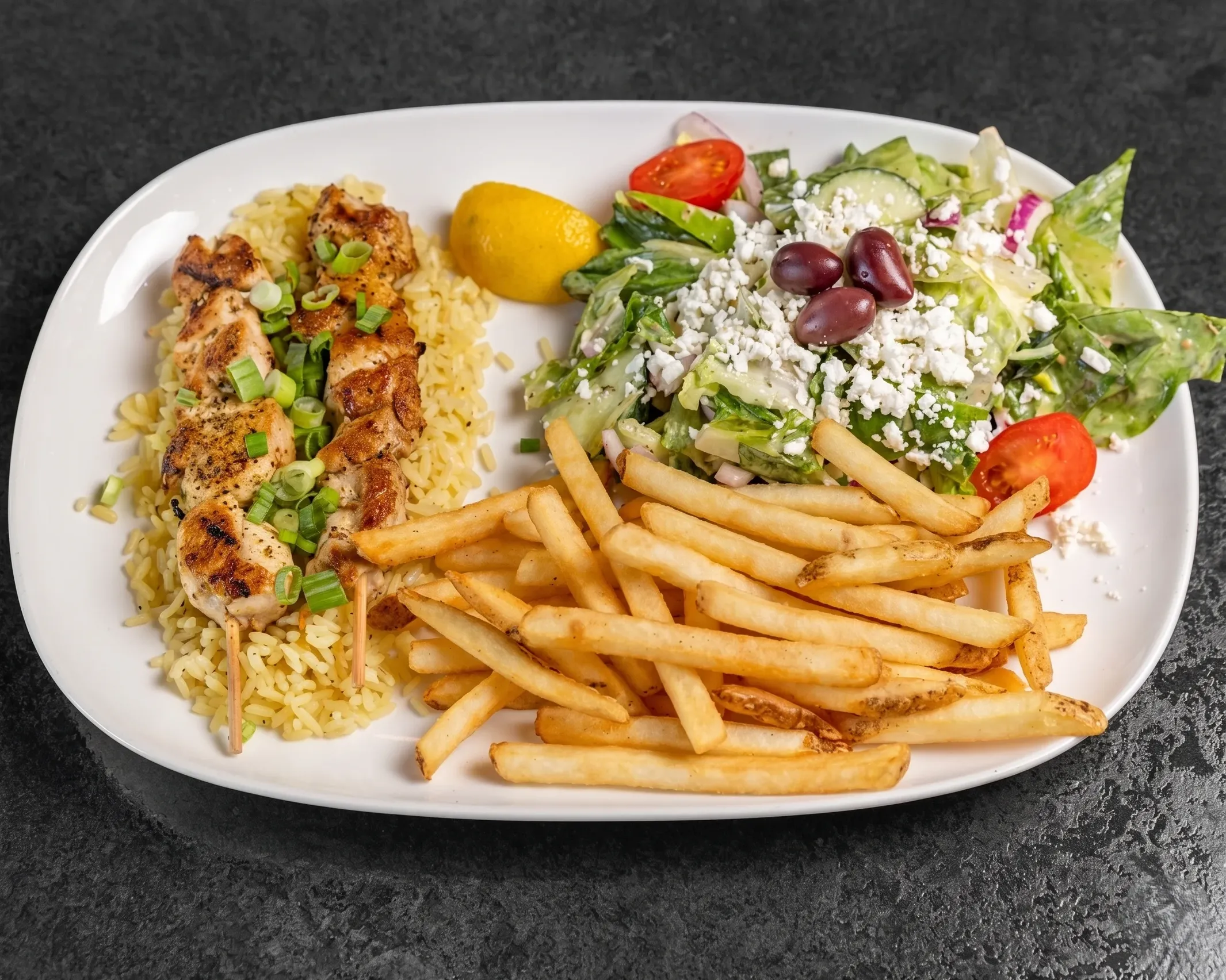 Greek chicken and pork souvlaki on skewers at Mr. Ribs Saskatoon